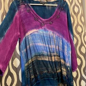 100% rayon tag says s/m  fits more like lg /xl